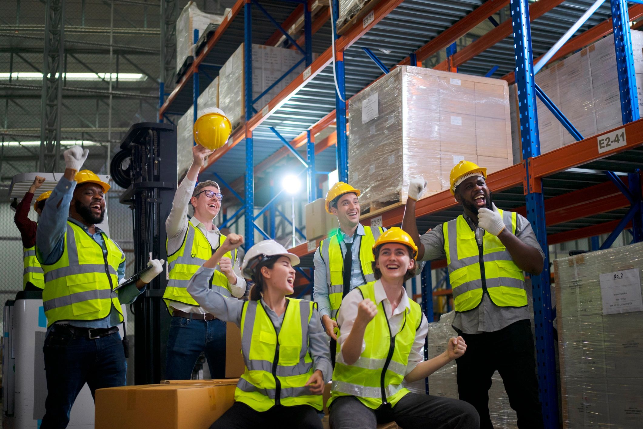 Supply chain team working in a warehouse environment