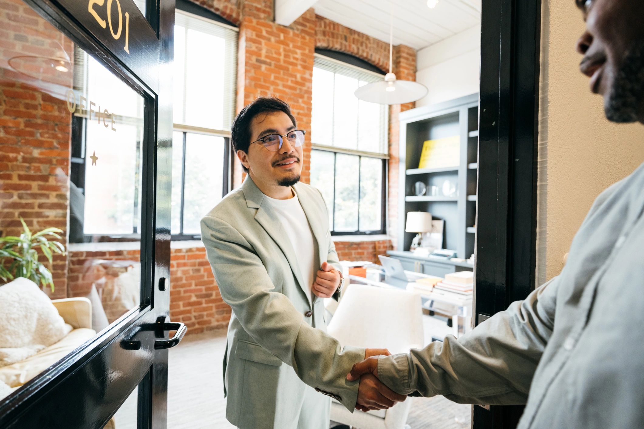 Professional client handshake representing trusted partnership